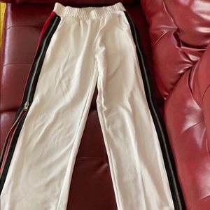 Cream pants with zipper on the side